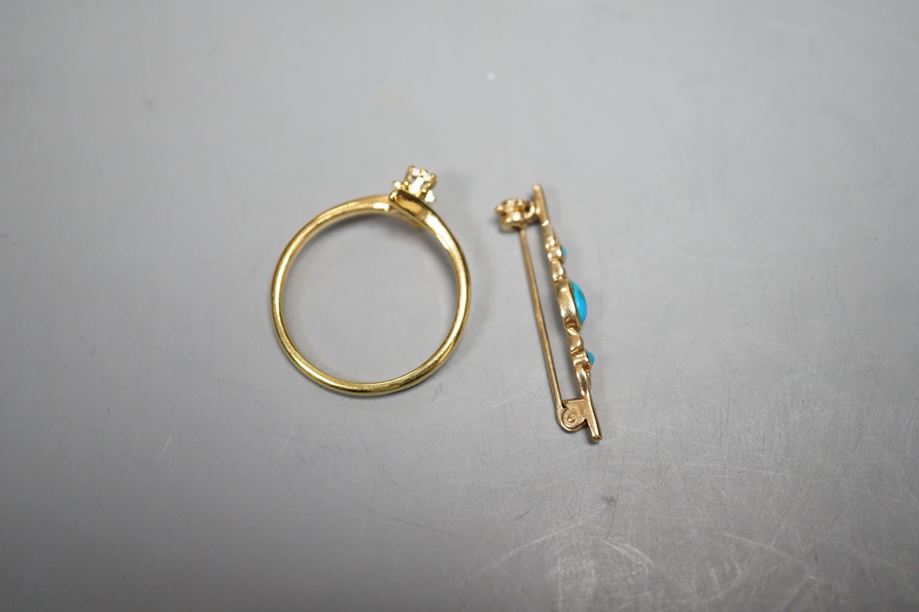 A small 375 yellow metal and three stone turquoise set bar brooch, 29mm, gross 1.1 grams and a ring.